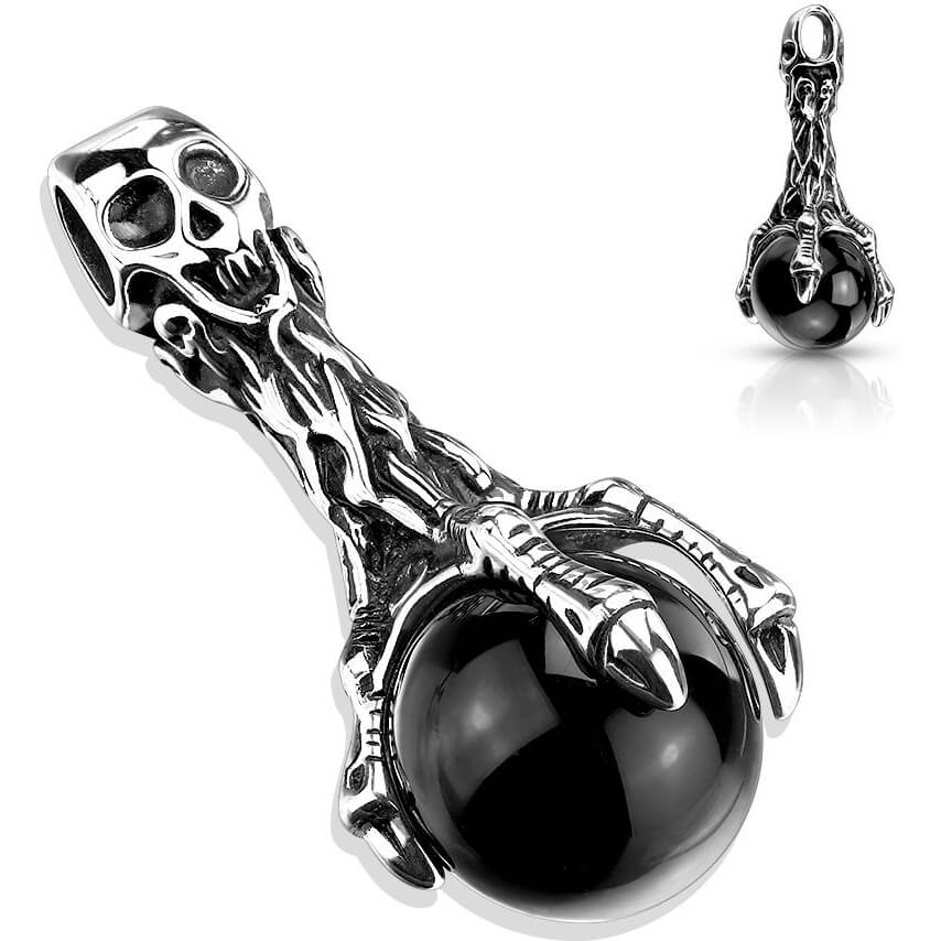 Calavera y garra de águila de plata con bola negra